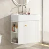 A white bathroom vanity with a sink and faucet, mounted on a tiled wall. Podgląd zdjęcia produktu
