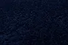 A close-up, textured view of a dark blue shaggy rug. Voir les images du produit