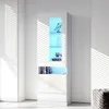 A tall, white, modern display cabinet with glass shelves and LED lighting. Náhled obrázku produktu