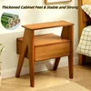 A wooden nightstand with a drawer and shelf, placed next to a bed. Náhled obrázku produktu