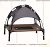 A raised dog bed with a canopy, featuring labels pointing out its features. Voir les images du produit