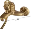 A close-up view of a vintage-style brass shower faucet with a handheld shower hose attached. A measurement indicator is present. Náhled obrázku produktu