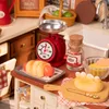 A miniature kitchen scene with baking items. Náhľad obrázku produktu