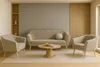 A beige couch set with two armchairs and a coffee table in a minimalist living room setting. Náhľad obrázku produktu