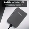 A gray power bank with a charging cable plugged in, resting on a light gray and white surface. Text overlays describe its features. Produktbild-Vorschau