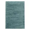A close-up, top-down view of a blue shag rug. Produktbild-Vorschau
