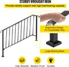 A black wrought iron stair railing with informational callouts highlighting its features. Produktbild-Vorschau