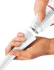 Hands assembling a white hand mixer against a white background. Produktbild-Vorschau
