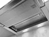 A close-up view of the underside of a stainless steel range hood, showing the filter and lights. Voir les images du produit