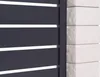A close-up view of a modern gray aluminum gate and a white stone pillar. Produktbild-Vorschau