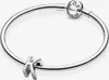 A silver Pandora bracelet with a charm shaped like the letter K. Anteprima dell’immagine prodotto