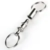 A detached metal keychain coupling with two keyrings, shown against a white background. Produktbild-Vorschau