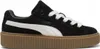 A single black Puma Creeper Phatty shoe with white accents and a brown platform sole is shown against a white background. Anteprima dell’immagine prodotto
