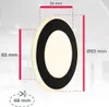 A diagram showing the dimensions of a black and white oval-shaped light fixture. Produktbild-Vorschau