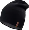 A black beanie hat is shown against a white background. Náhled obrázku produktu