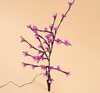 A pink LED flower tree on a light peach background. Produktbild-Vorschau