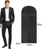 A man in a suit stands next to a garment bag with dimensions shown. Podgląd zdjęcia produktu