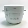 A white Yum Asia rice cooker is shown against a white background. Voir les images du produit