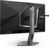 The back of a black computer monitor with a gray stand. Produktbild-Vorschau