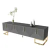 A gray TV stand with gold accents and legs, displayed on a white background. Produktbild-Vorschau