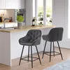 A modern kitchen island with two bar stools and a sink area. Produktbild-Vorschau