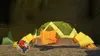 Mario is running towards a giant origami turtle in a cave. Produktbild-Vorschau