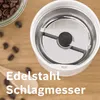 Close-up view of the inside of a coffee grinder with text overlay. Anteprima dell’immagine prodotto