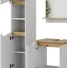 A close-up view of a white and oak bathroom cabinet set. Anteprima dell’immagine prodotto