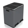 A dark gray dual-compartment trash can with silver pedals and handles, shown from a 3/4 front angle on a white background. Produktbild-Vorschau