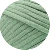 A close-up view of green yarn. Produktbild-Vorschau