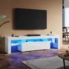 A modern living room with a white TV stand featuring RGB lighting. Podgląd zdjęcia produktu