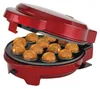 A red donut or muffin maker with multiple food items baking inside. Produktbild-Vorschau