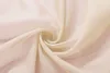 A close-up of draped, sheer fabric, creating a swirling pattern. Produktbild-Vorschau