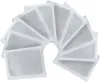 A fan arrangement of multiple white detox foot pads with gray filling. Produktbild-Vorschau