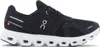 A studio shot of a black and white running shoe. Anteprima dell’immagine prodotto