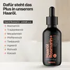 A product shot of a hair oil bottle with text listing ingredients and benefits. Produktbild-Vorschau