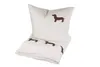 A white duvet cover and pillowcase set with brown dachshunds printed on it, laid out on a white background. Produktbild-Vorschau