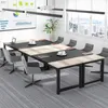 A modern conference room with a large rectangular table and chairs. Anteprima dell’immagine prodotto