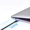 A close-up shot of a USB-C cable plugged into a laptop, with blue light effects indicating power flow. Náhled obrázku produktu