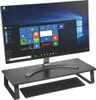 A computer monitor and keyboard are shown on a black monitor stand. Náhled obrázku produktu