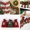 A collage of images showing Christmas advent calendars with small fabric bags, some decorated with wooden ornaments, and some displayed on a staircase with garland and lights. Podgląd zdjęcia produktu