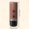 A portable electric espresso machine with dimensions indicated. Produktbild-Vorschau