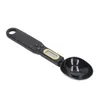 A black digital spoon scale against a white background. Náhľad obrázku produktu
