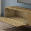 A close-up view of an open cabinet door on a wooden TV stand, showing a gas strut mechanism. Produktbild-Vorschau