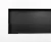 A close-up view of a modern white wall-mounted ethanol fireplace with a black interior and a glass shelf. Anteprima dell’immagine prodotto
