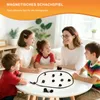 A family playing a magnetic Xiangqi game at a table. Produktbild-Vorschau