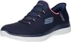 A single navy blue Skechers Slip-ins sneaker with pink accents and a white sole, shown from a side-diagonal angle on a white background. Produktbild-Vorschau