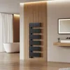 A modern bathroom with a freestanding bathtub, a wooden accent wall, and a black towel warmer. Anteprima dell’immagine prodotto