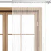 A string curtain hanging in front of a wooden window frame. Náhled obrázku produktu
