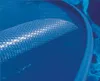 A close-up view of a solar pool cover partially submerged in blue water. Produktbild-Vorschau
